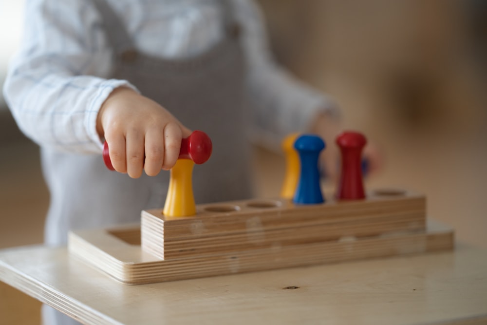 a person holding a toy