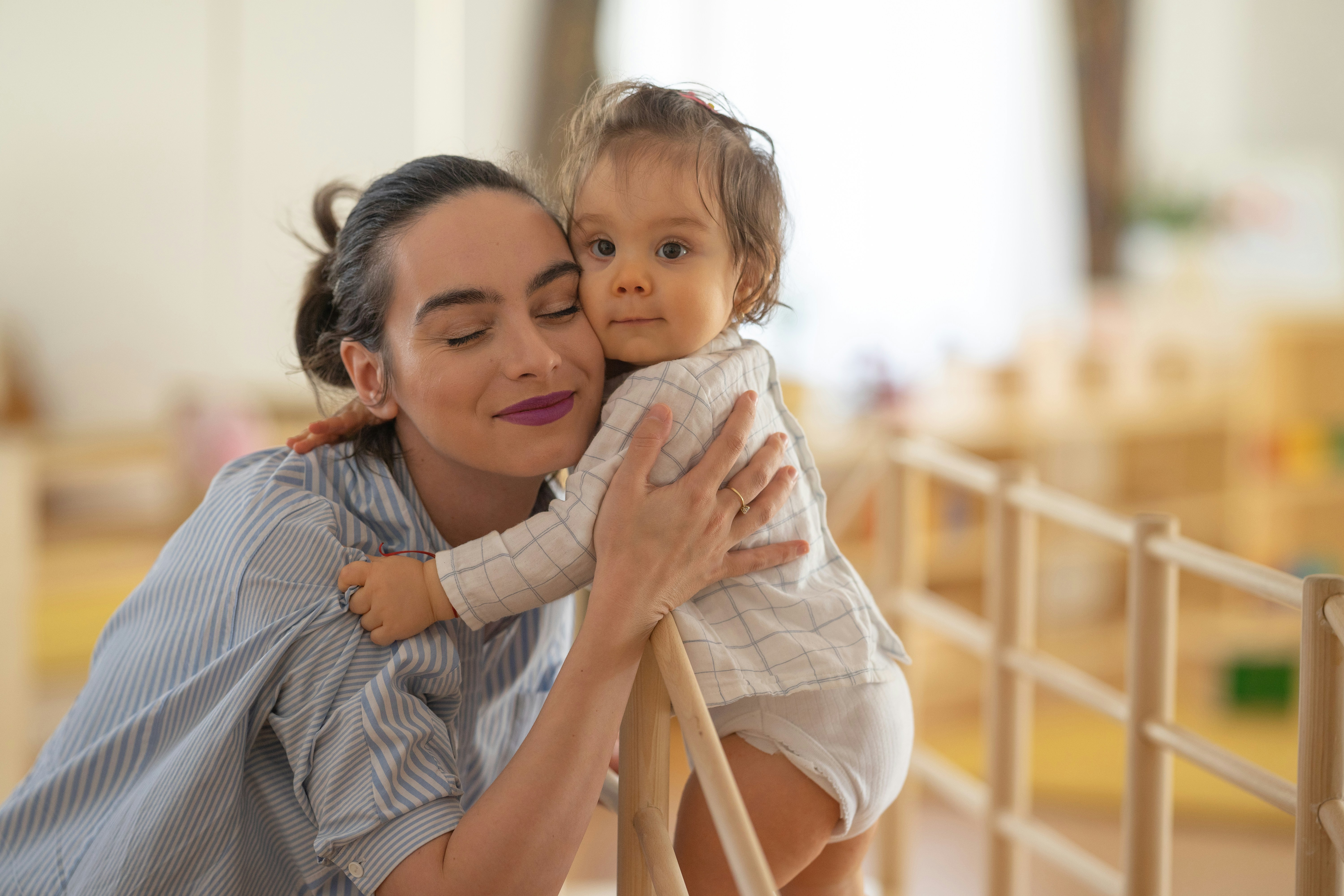 a person holding a baby