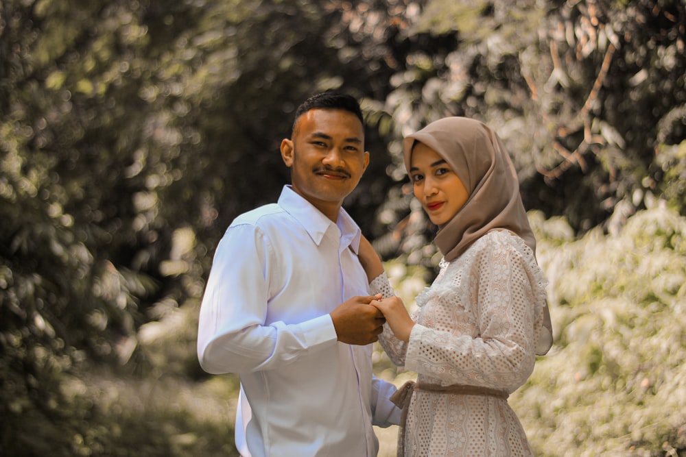 a man and woman posing for a picture