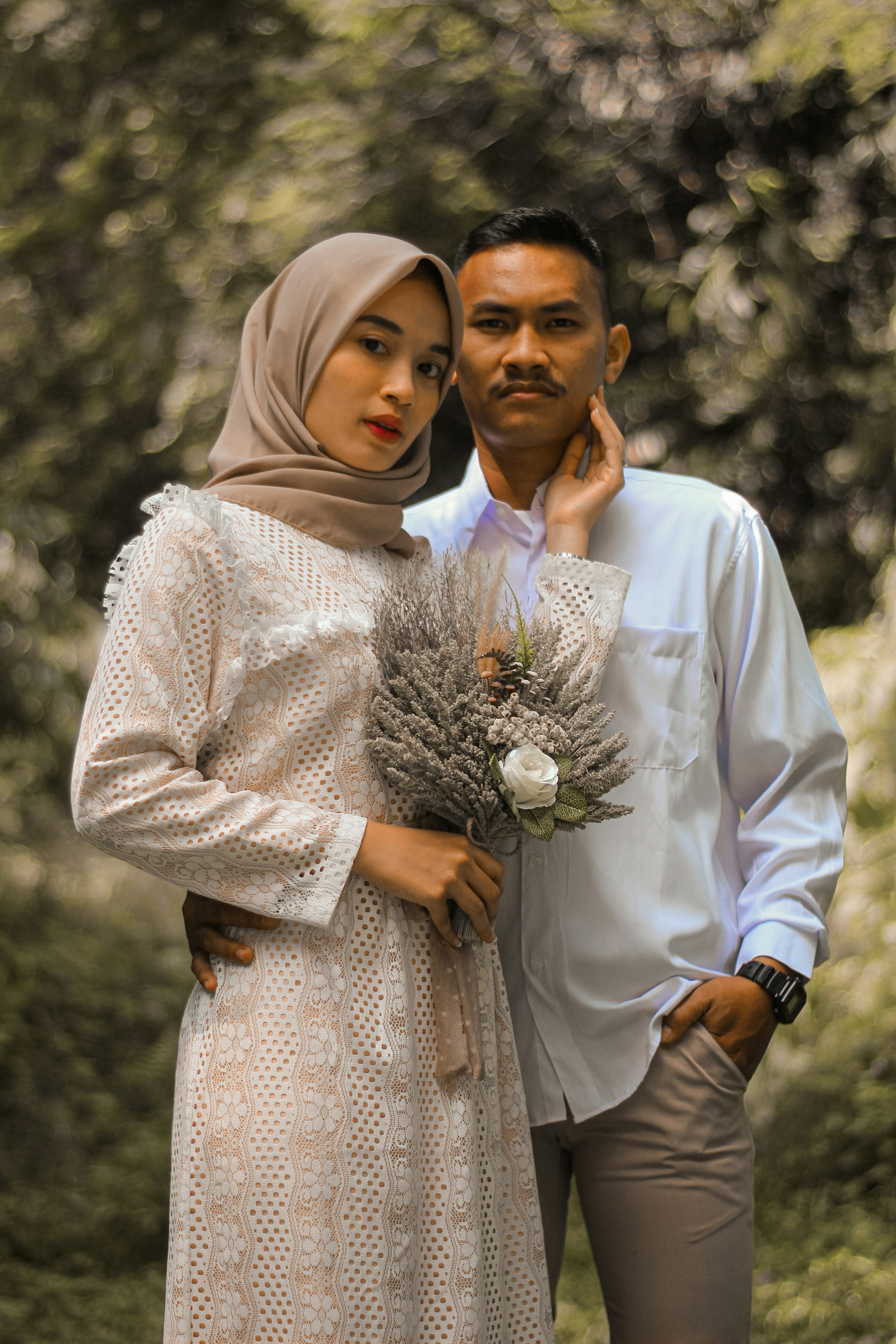 a man and woman posing for a picture