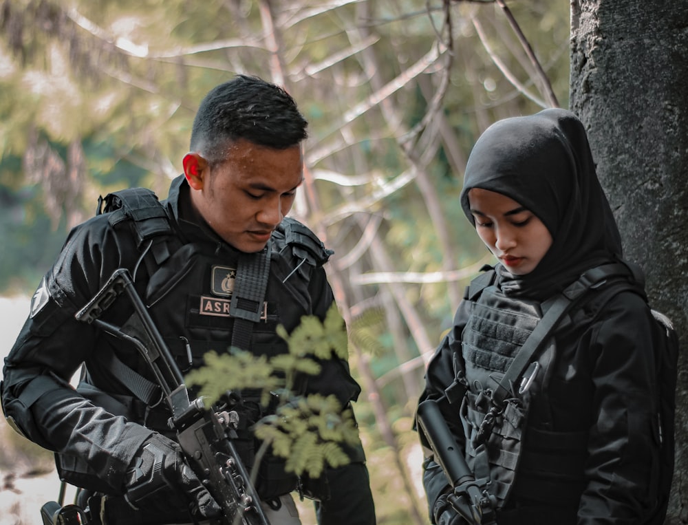 a man and woman in military uniforms