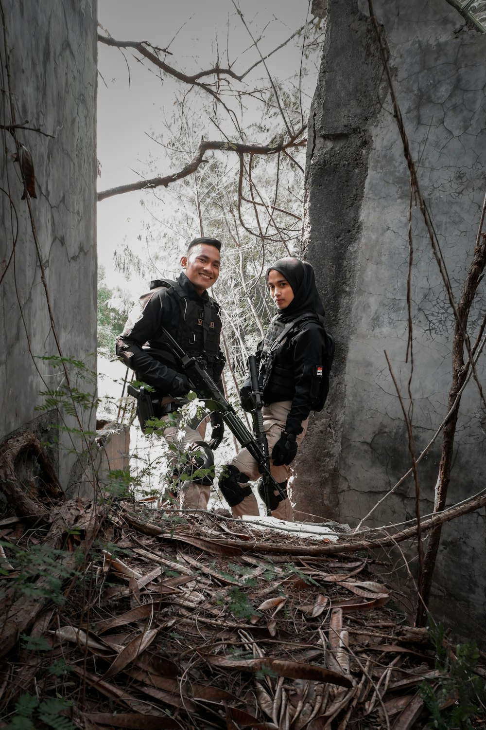 a man and woman standing in a tree