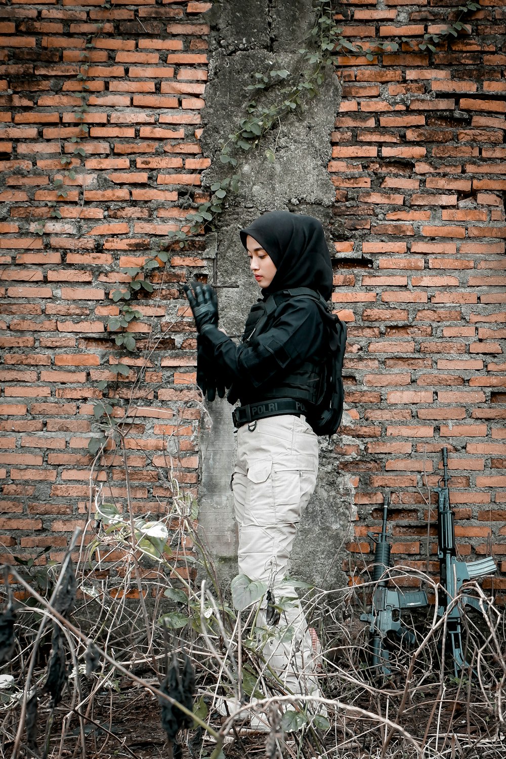 a person standing next to a tree