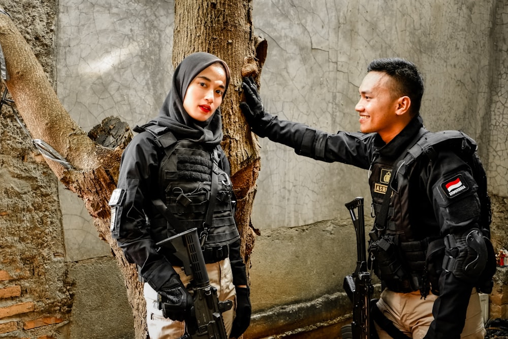 a man and woman in uniform