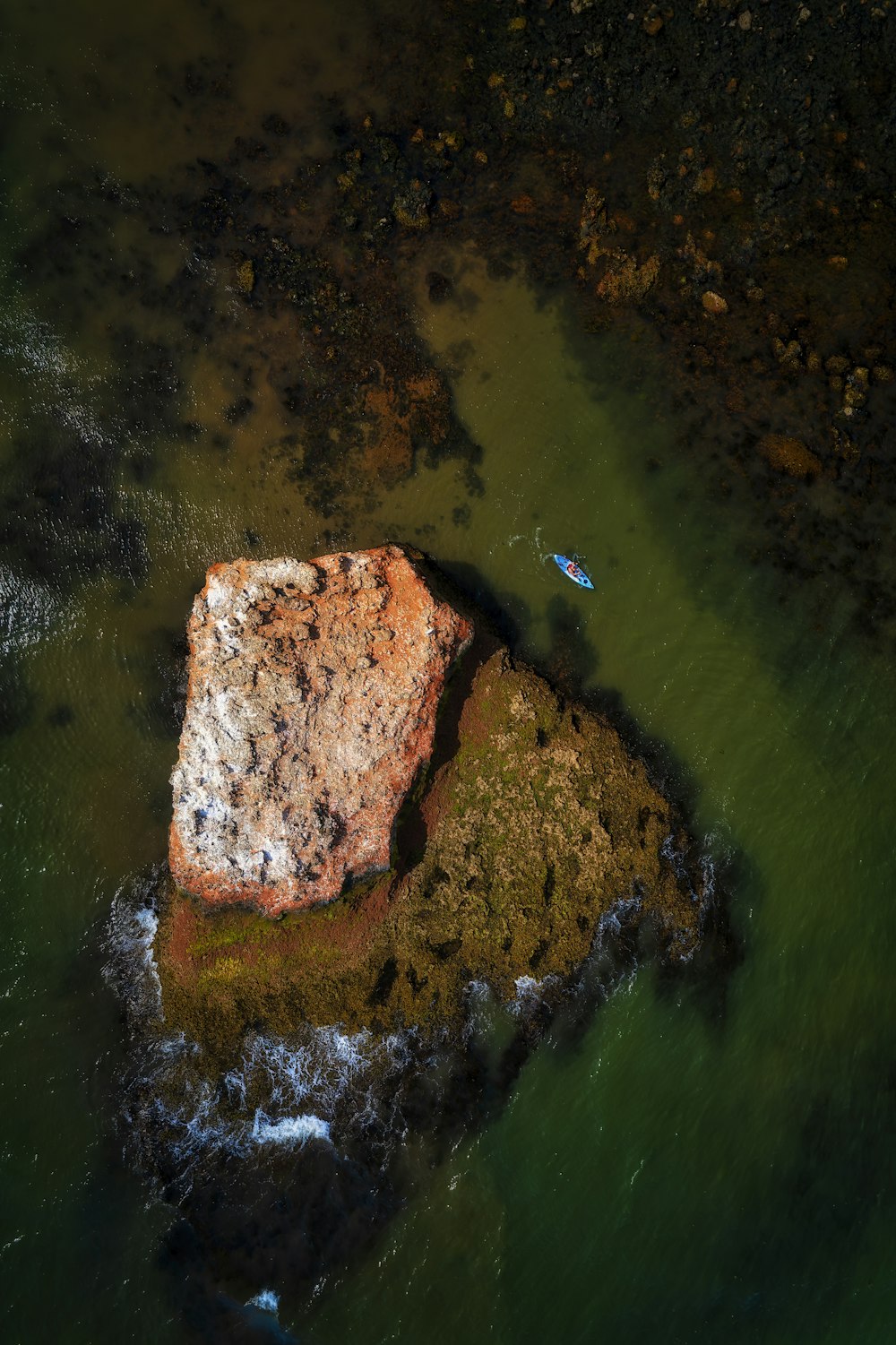 a rock in the water