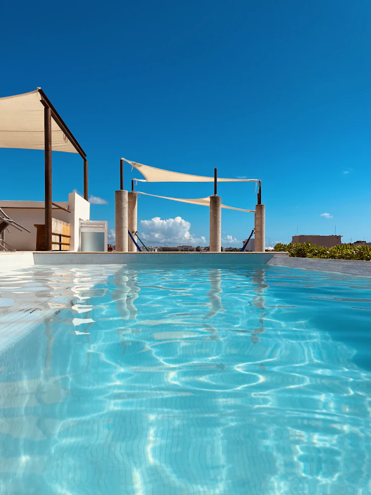 A luxurious pool overlooking the Caribbean ocean