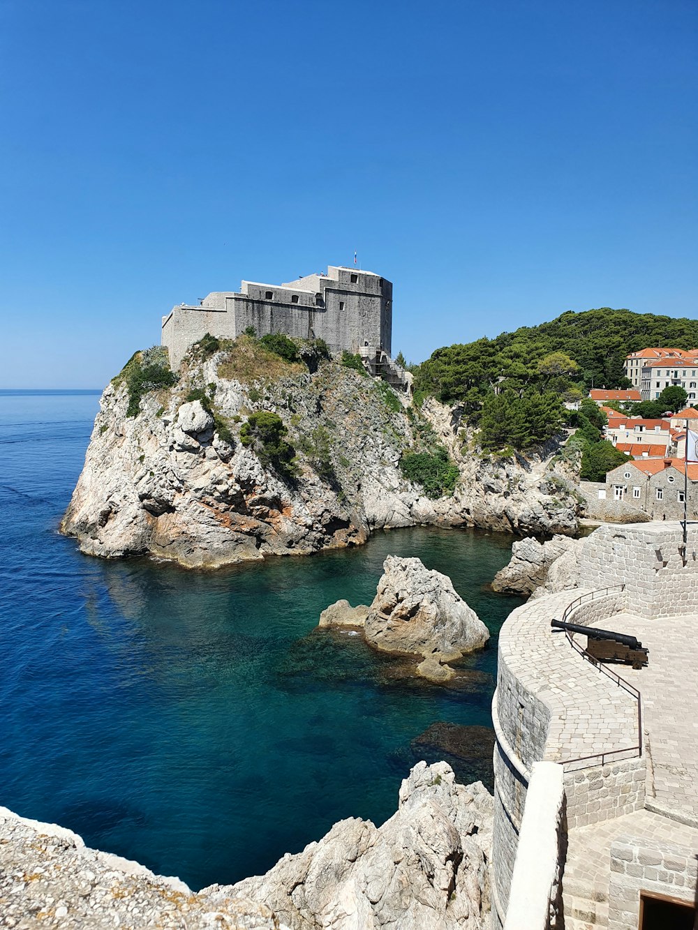 a castle on a rocky cliff