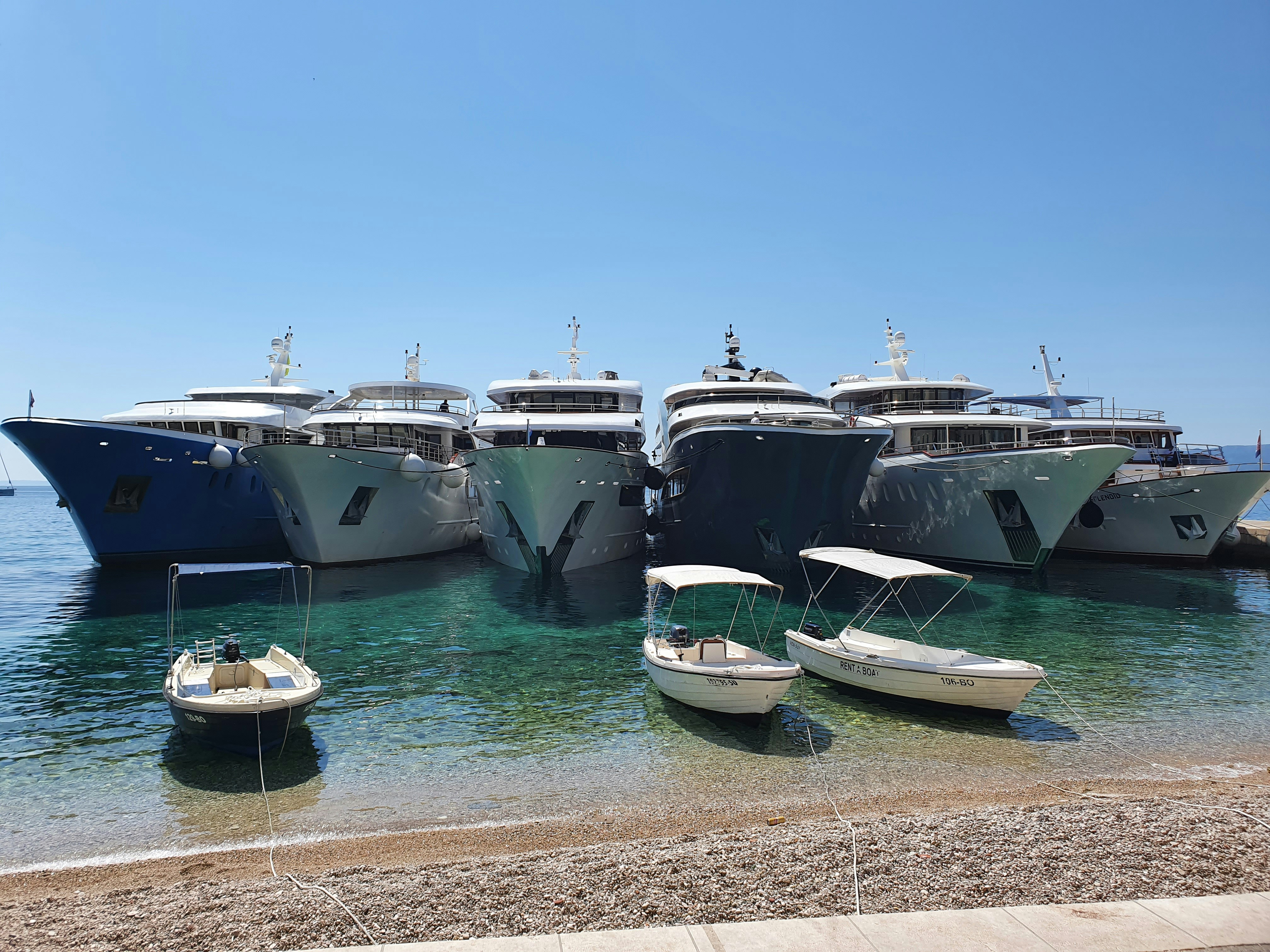 a group of boats in a harbor