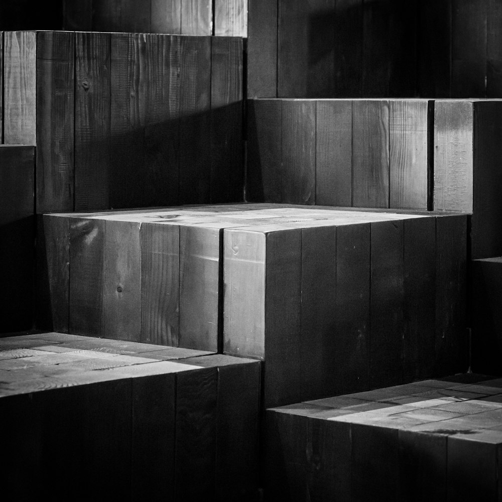 a black and white photo of a room with a wood floor