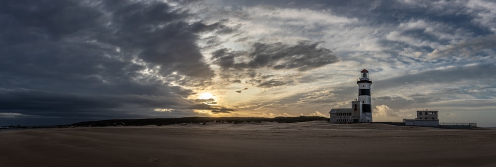 a lighthouse in a large field