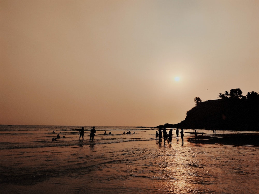 a group of people on a beach