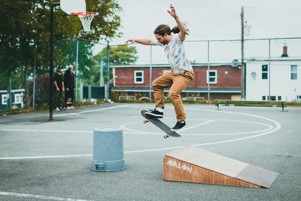 a man jumping on a skateboard