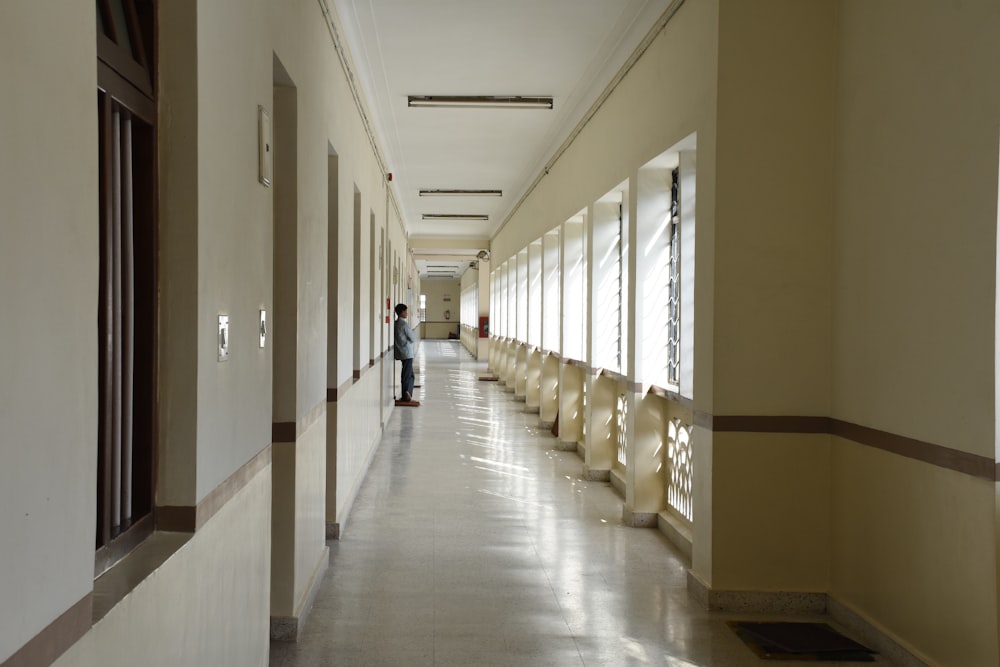 a person walking down a hallway