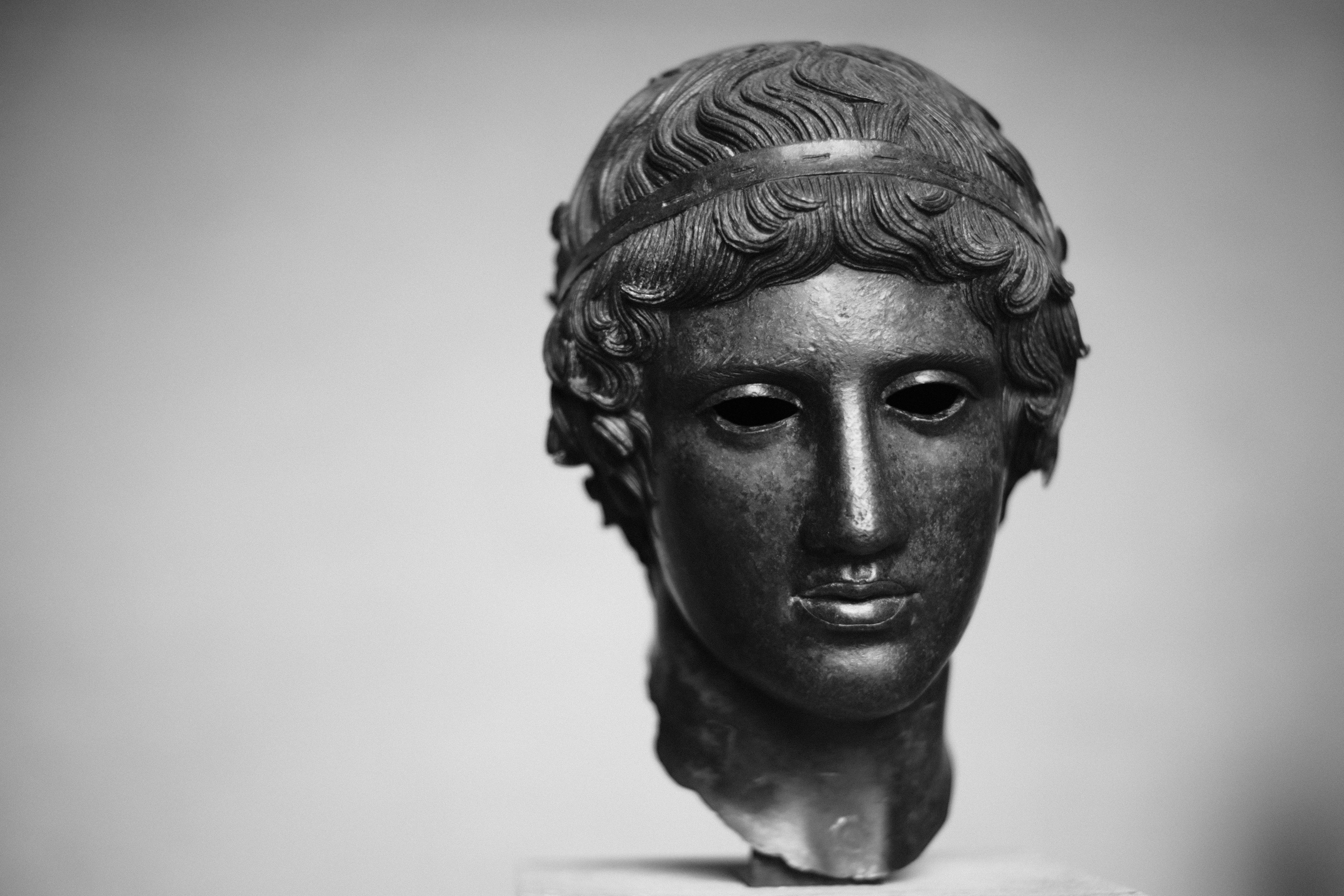 Foto zum Thema Eine Statue eines Mannes Kostenloses Bild zu Grau auf