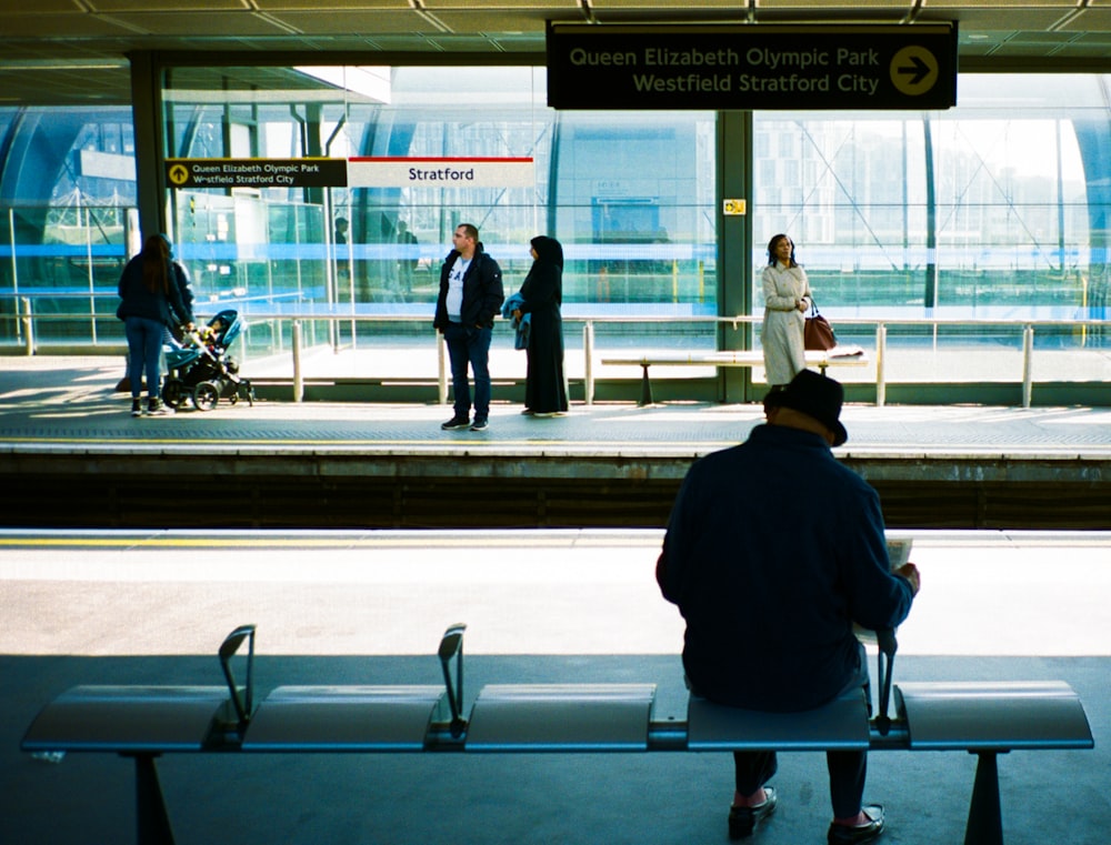 a person sitting on a bench