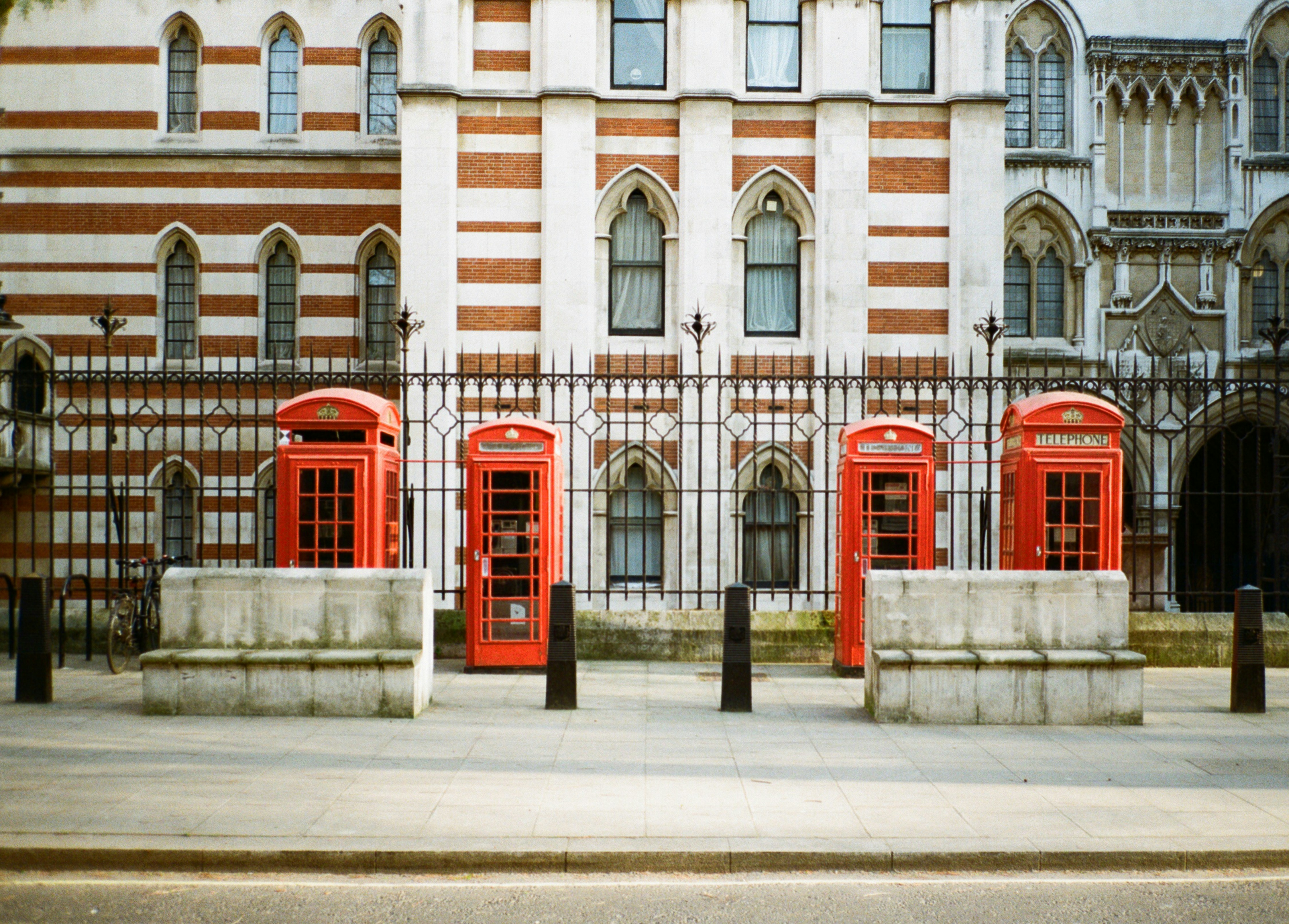 a row of red telephone booths