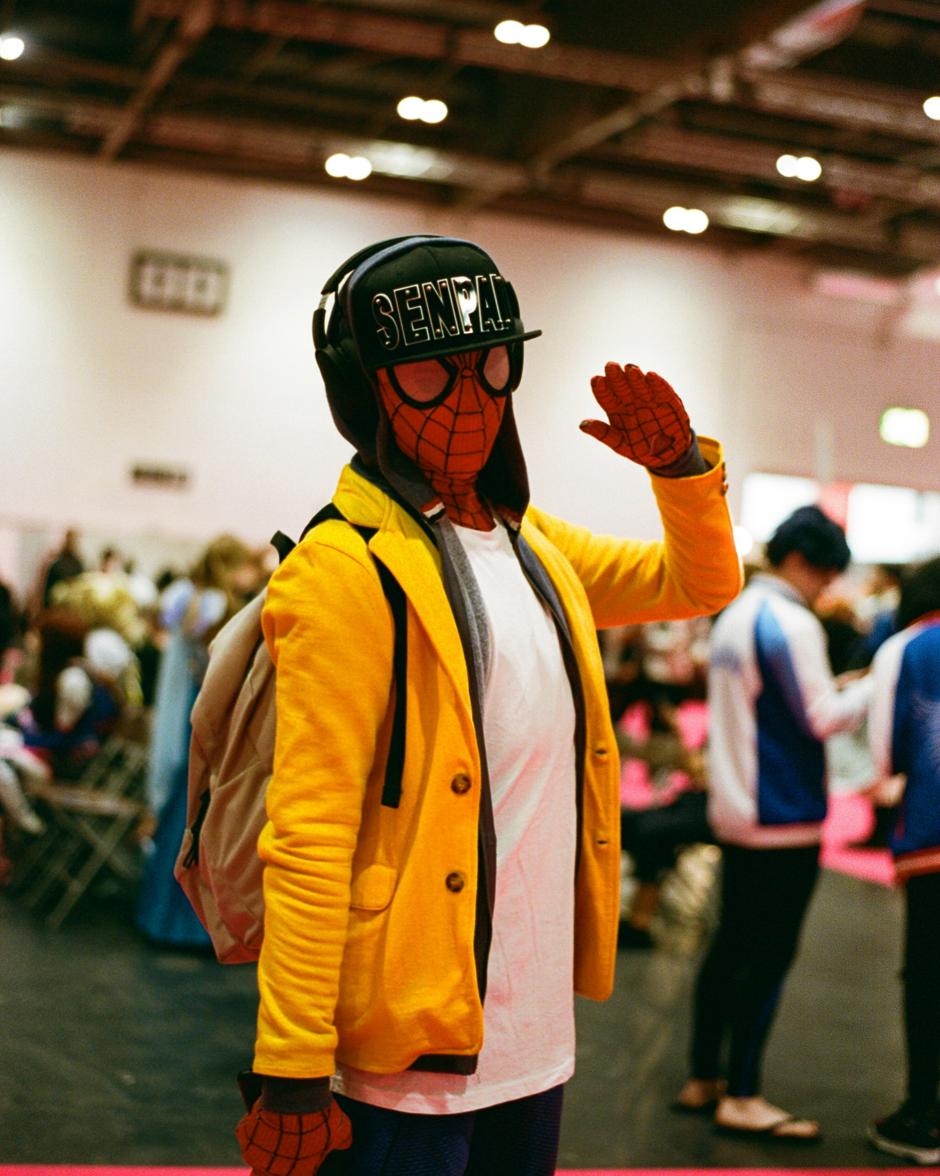 Fans at a comic convention dressed as Eleceed characters