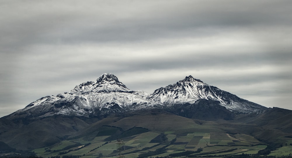 a mountain with snow on it