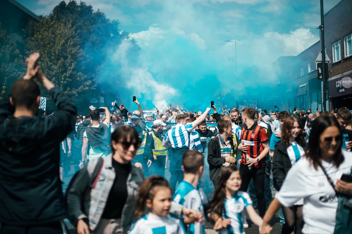 Football crowd celebrating goal