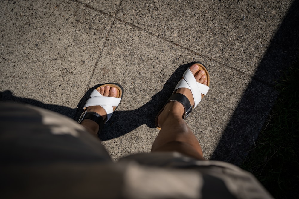 a pair of feet with sandals