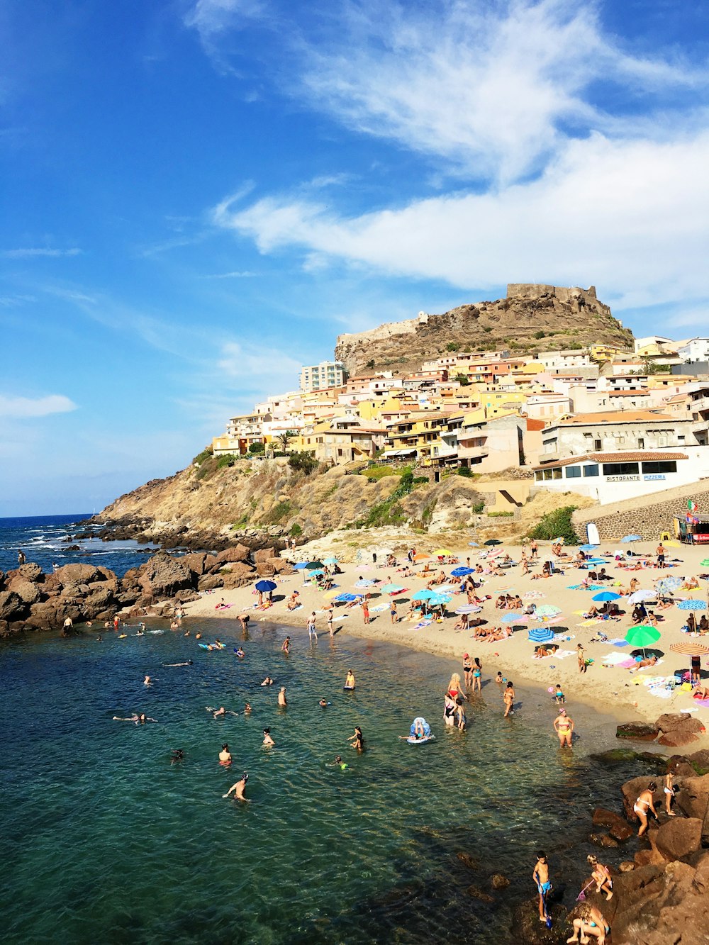 a crowded beach with people