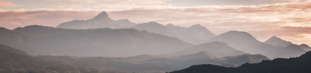 a landscape with mountains in the back