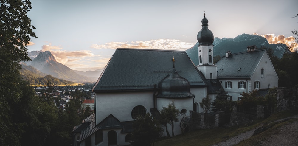 a building with a mountain in the background