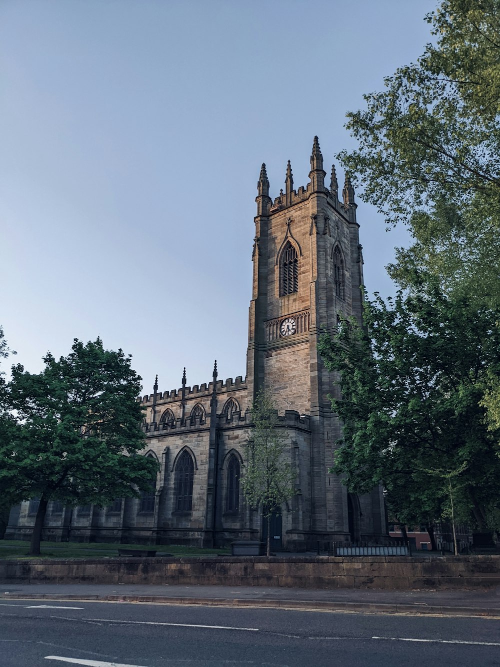 a large stone building with a clock tower