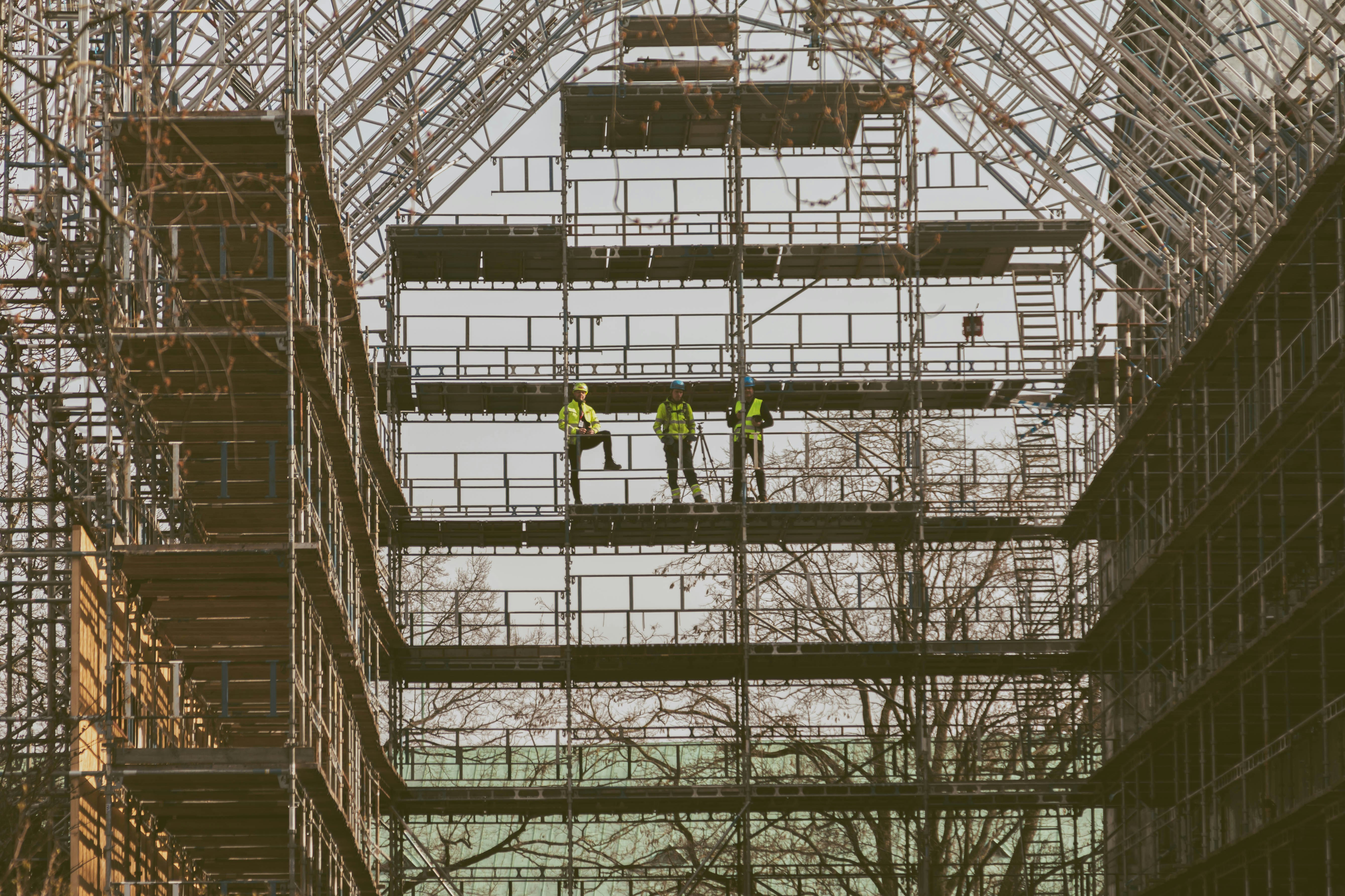 a group of people climbing a tower