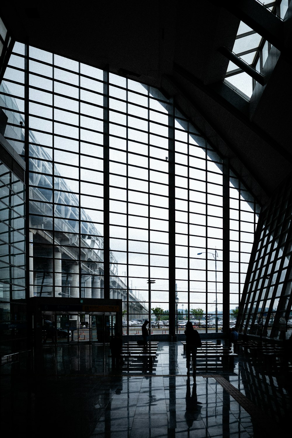 a large glass building with many windows