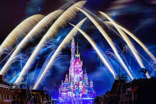 a castle lit up at night