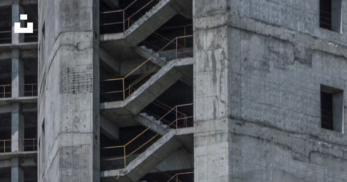 Building Scrace A building with a staircase photo – Free Construction Image on Unsplash