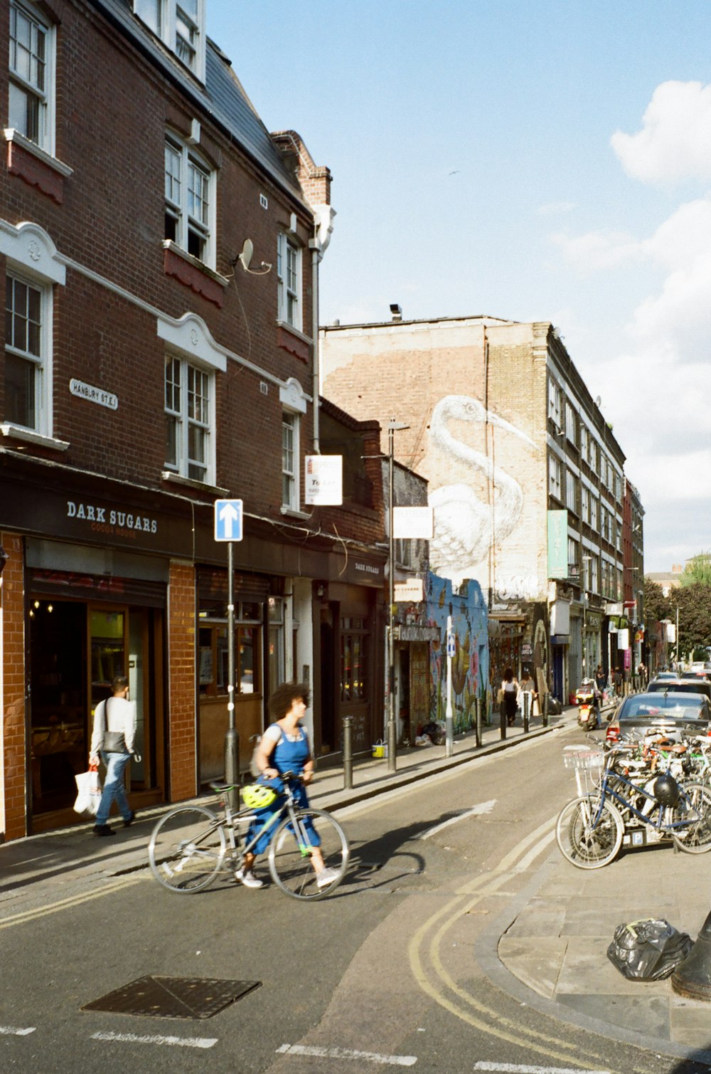 a person riding a bicycle on a street