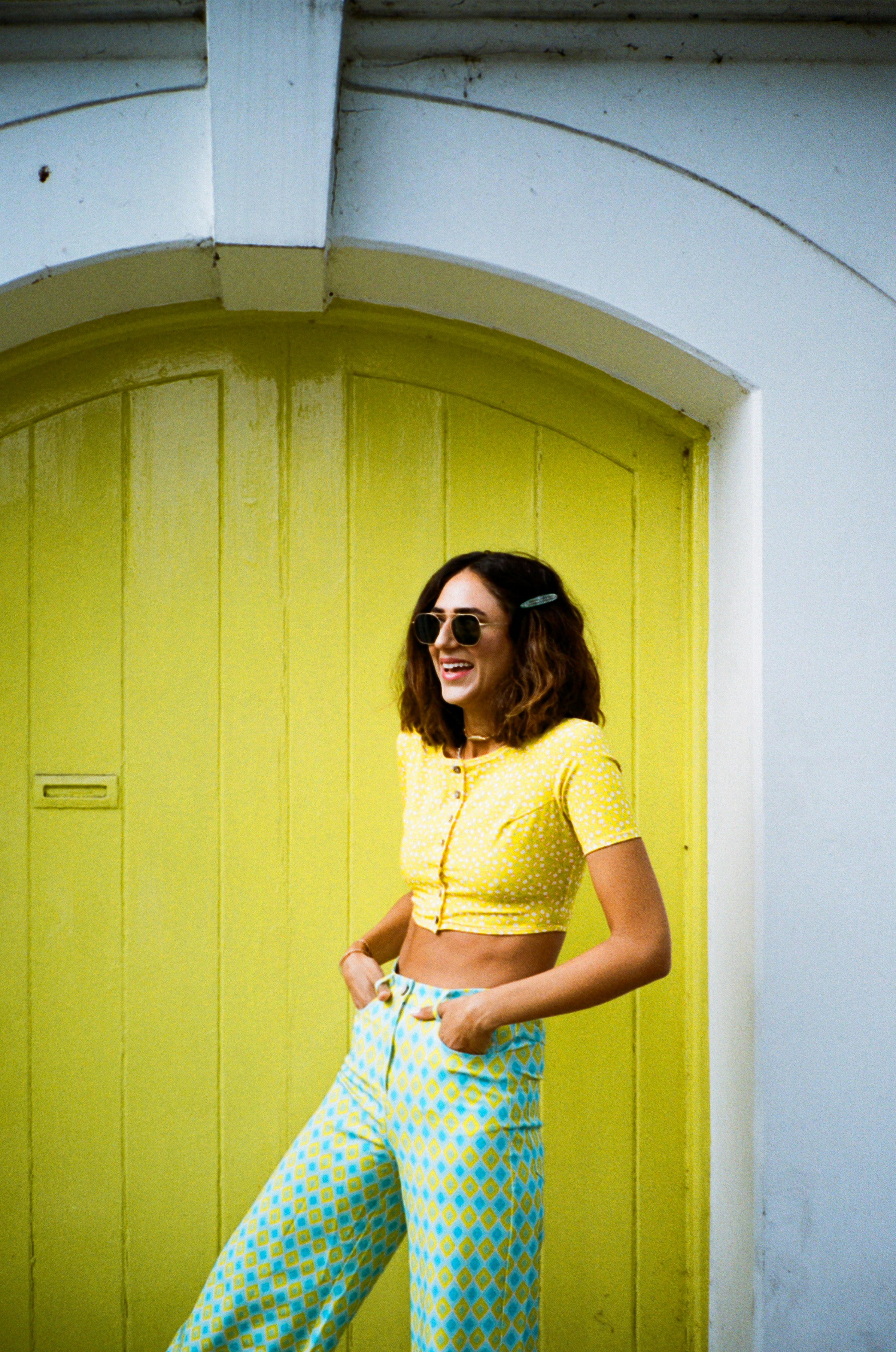 A woman in a yellow shirt photo – Free Yellow Image on Unsplash