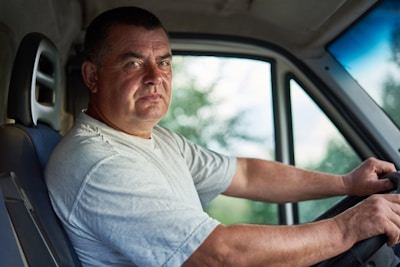 a man sitting in a car