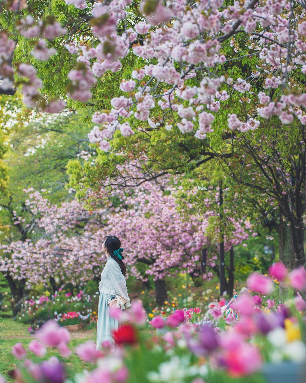 a person standing in a garden