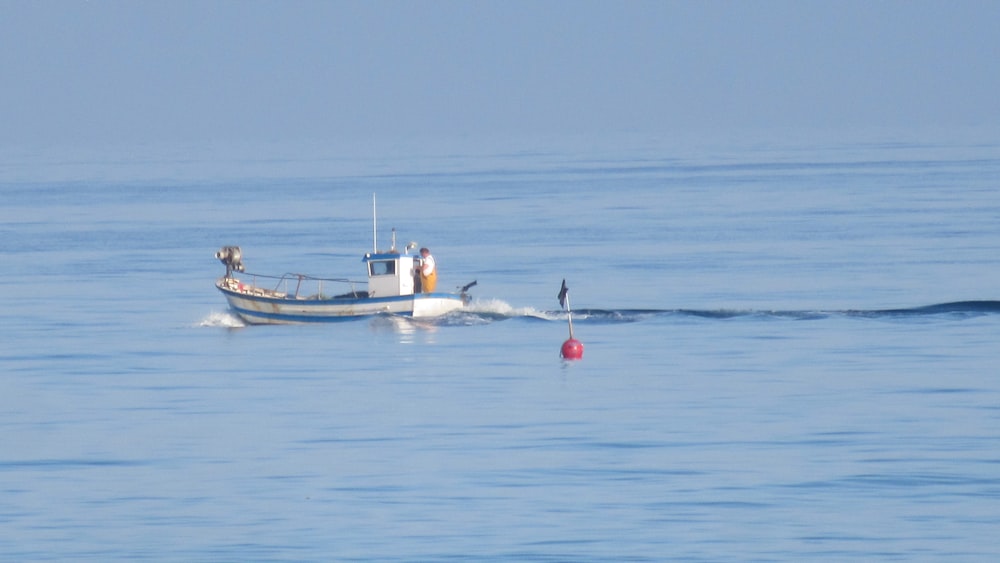 a boat sailing on the sea