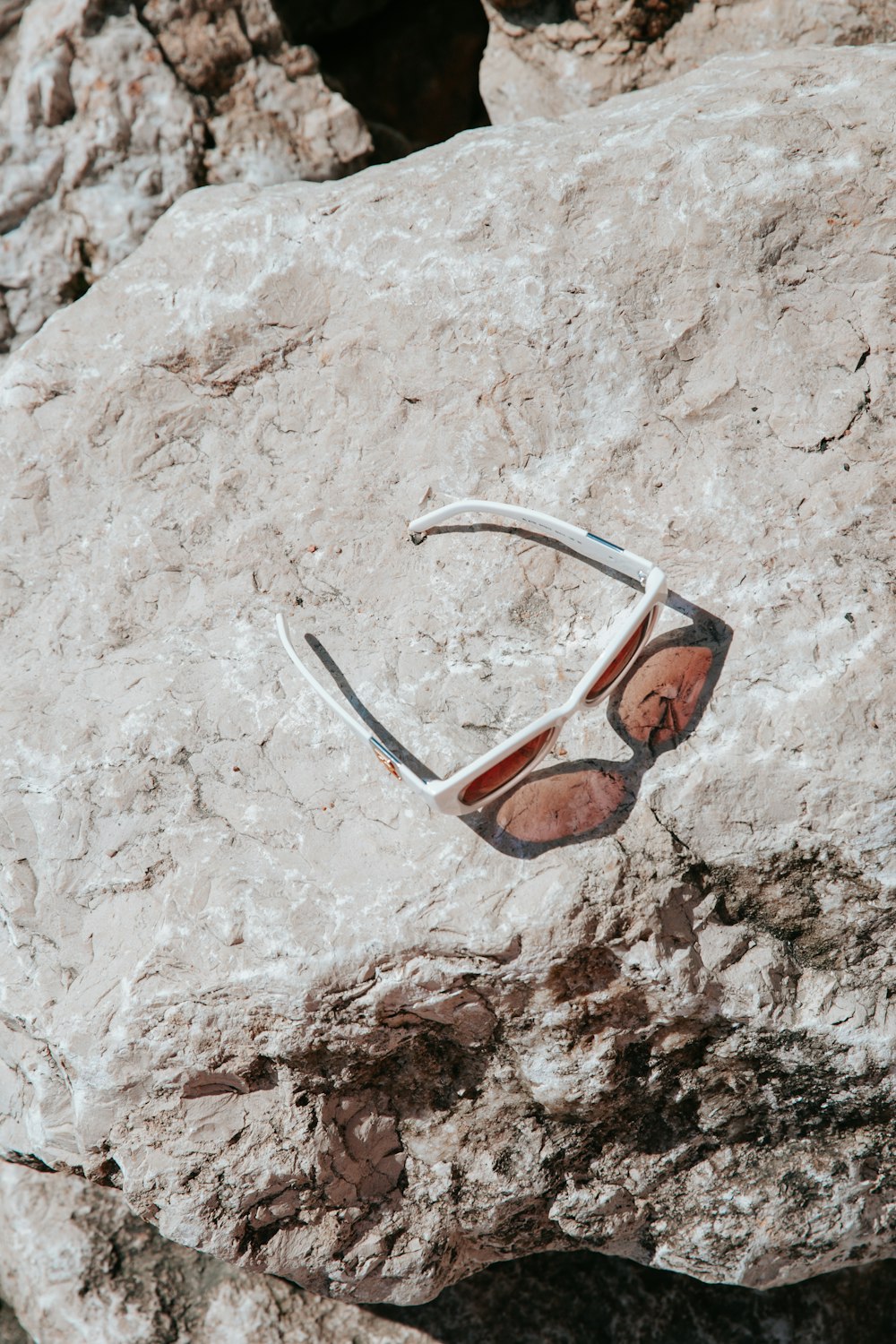 a person in a hole in the ground with a knife