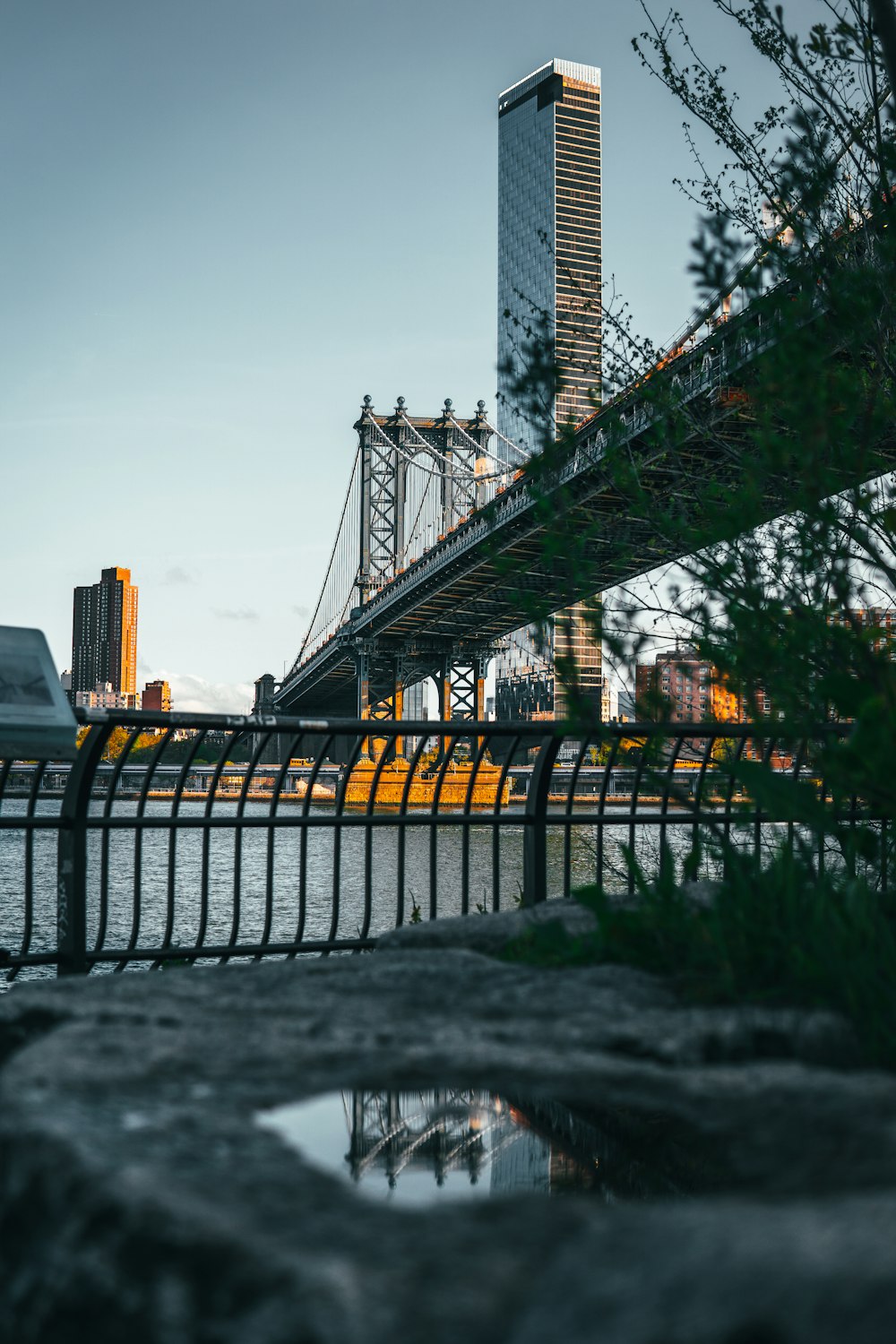 a bridge with a tower in the background