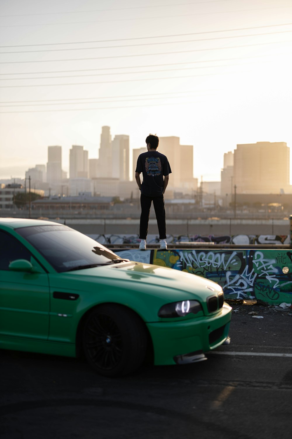 a person standing on a car