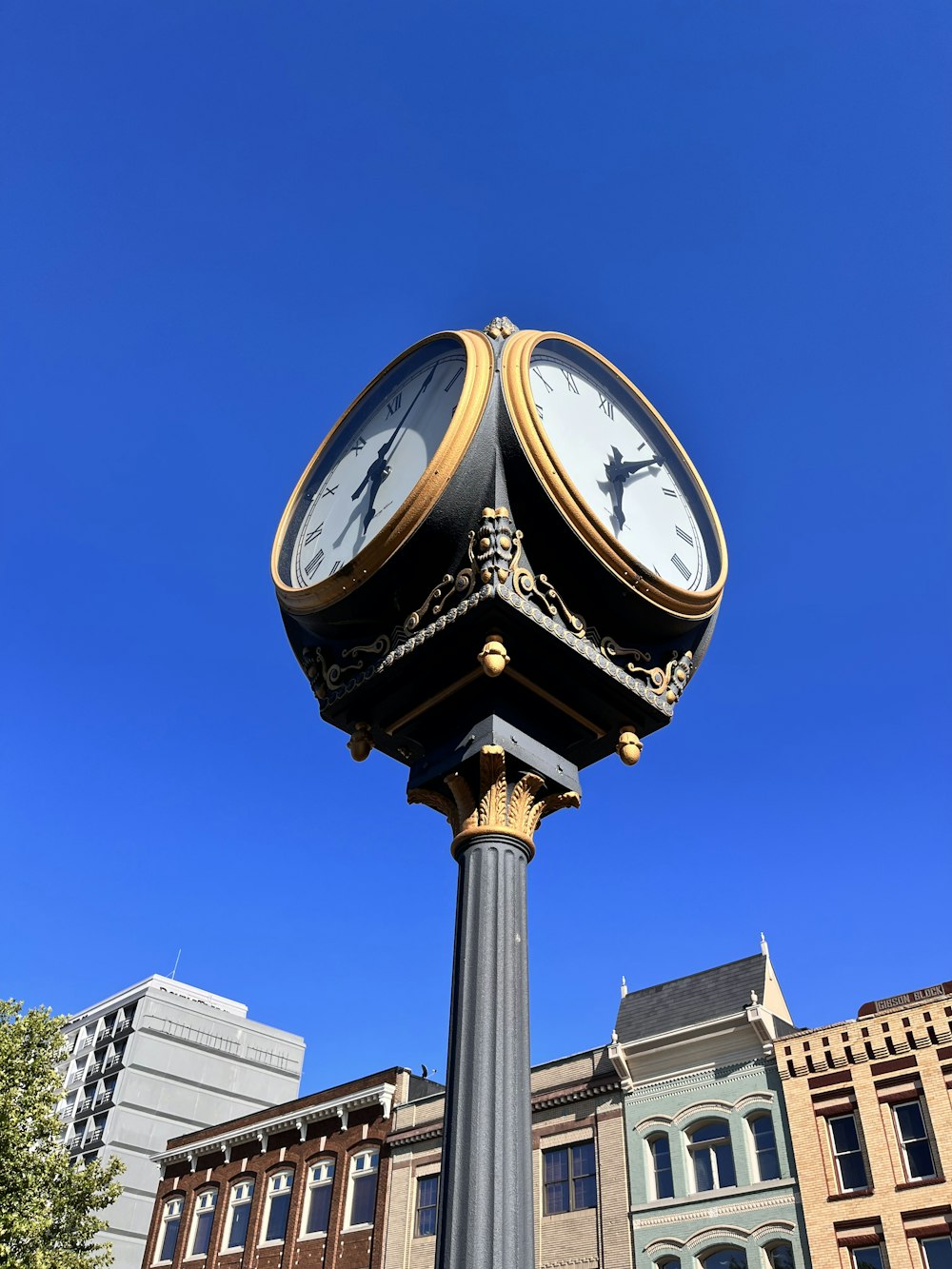 a clock tower with a couple of clocks on it