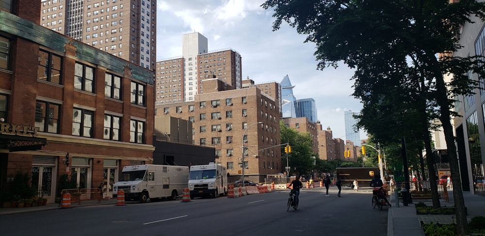 a street with buildings and people