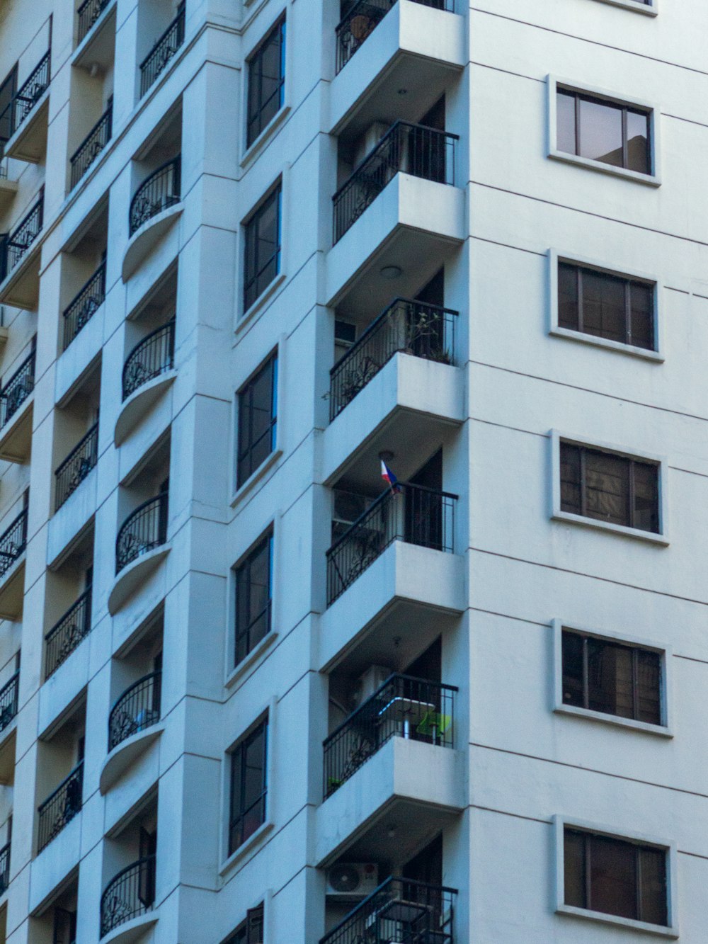 a building with balconies and windows