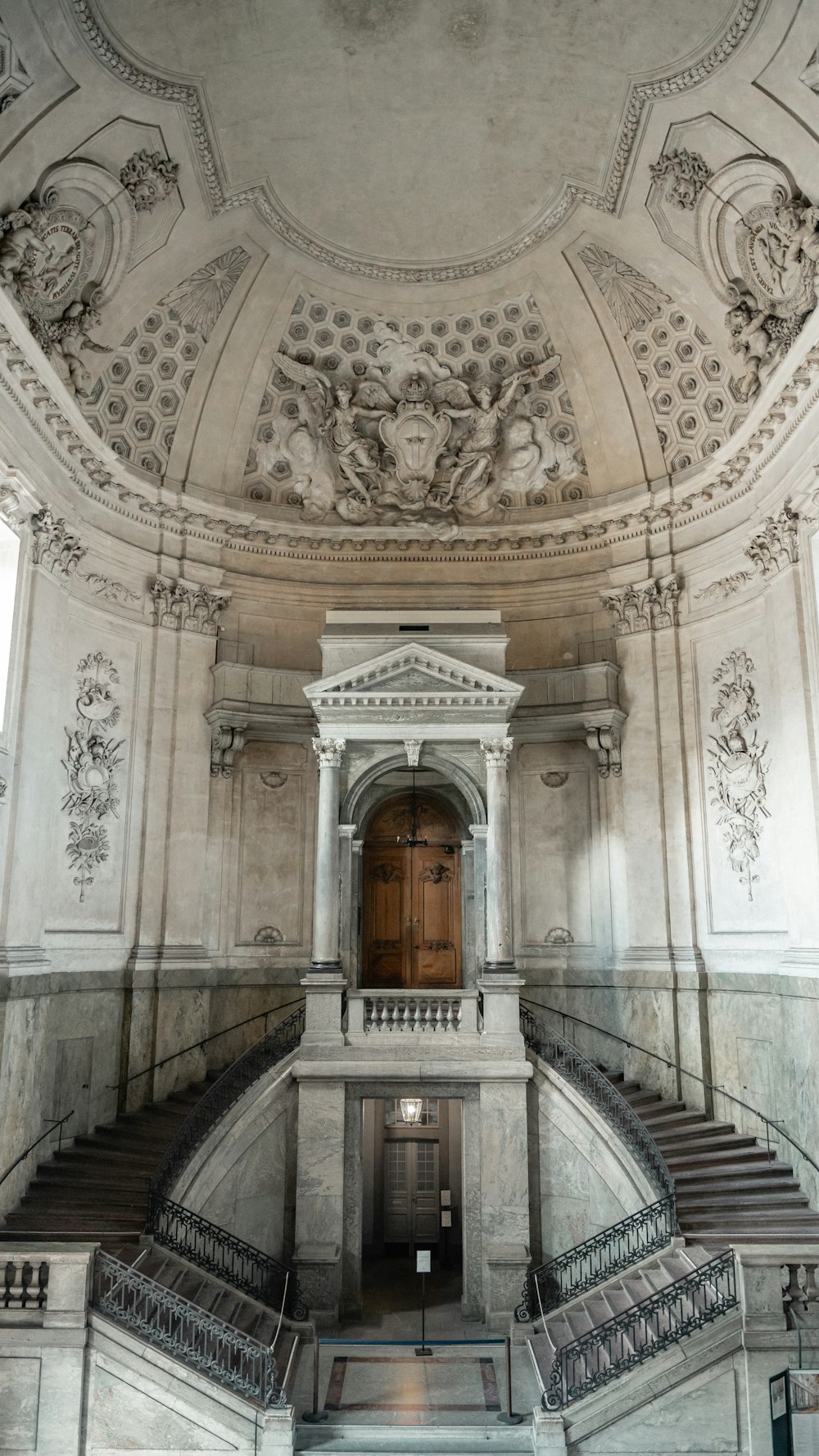 a large ornate building with a staircase