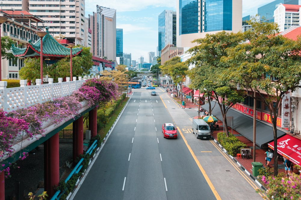 a street with cars and buildings on either side of it