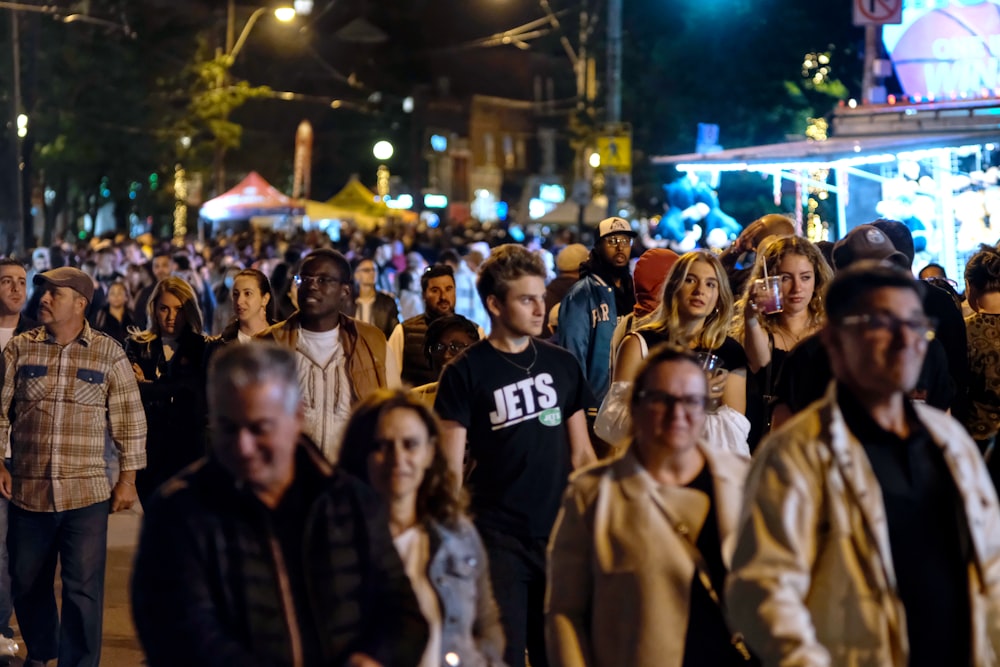 a crowd of people walking