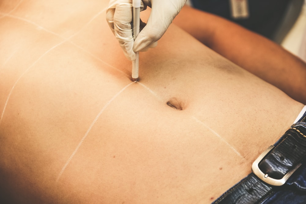 a person getting a tattoo