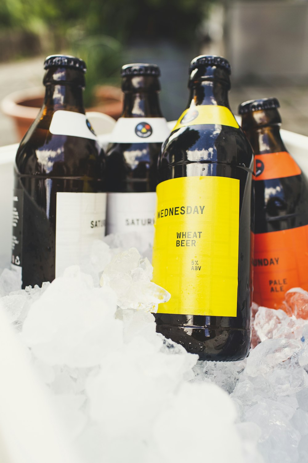 a group of bottles in the snow