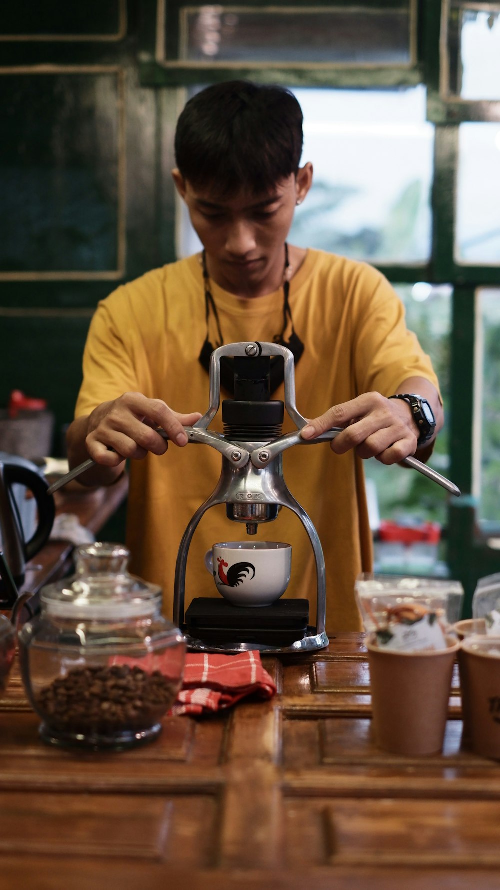 a man making a coffee maker