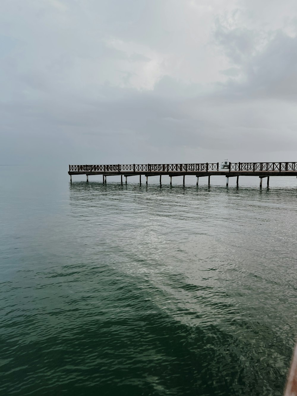 a pier with people on it